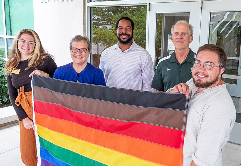 Students with Pride flag