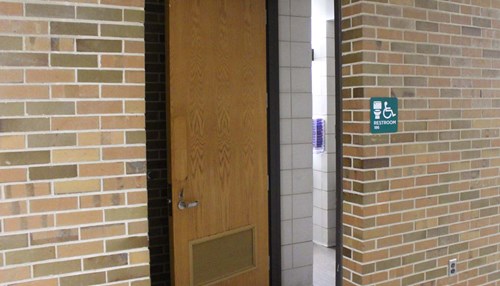 The outer door of an all-gender bathroom on MSU's campus.